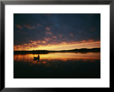 A Canoe At Sunset In East Manitoba by Bill Curtsinger Pricing Limited Edition Print image