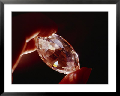 A Huge Nine-Carat Diamond Glistens With Light by Todd Gipstein Pricing Limited Edition Print image