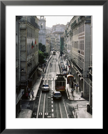 Traffic In The Baixa Area, Lisbon, Portugal by Yadid Levy Pricing Limited Edition Print image