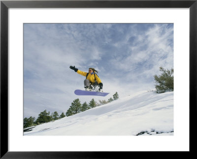 Woman Snowboarding On The Cinder Cone Near Sunset Crater by Kate Thompson Pricing Limited Edition Print image