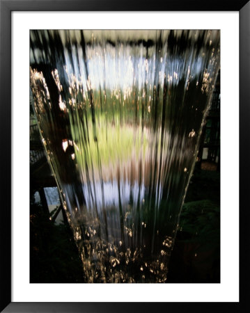 A Sheet Of Water Cascading Down An Indoor Waterfall by Raymond Gehman Pricing Limited Edition Print image