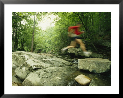Panned View Of Man Leaping Over Rocky Stream On The Appalachian Trail by Skip Brown Pricing Limited Edition Print image