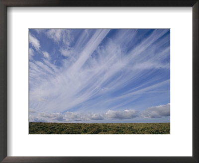 Clouds Fill The Sky Above A Wyoming Prairie by Joel Sartore Pricing Limited Edition Print image