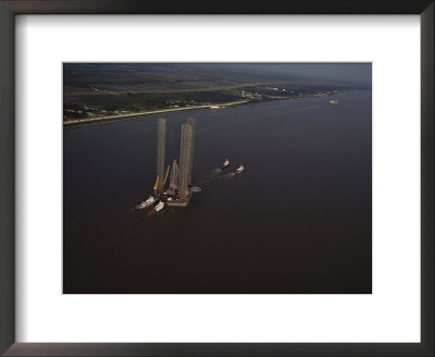Aerial View Of What Appears To Be The Legs Of A Bridge Or Oil Platform by Ira Block Pricing Limited Edition Print image