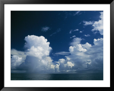 Dramatic Cloud-Filled Sky Over The Vast Pacific Ocean by Todd Gipstein Pricing Limited Edition Print image