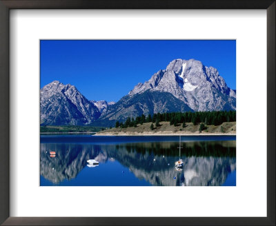 Mount Moran Reflected In Jackson Lake, Grand Teton National Park, Wyoming by Holger Leue Pricing Limited Edition Print image