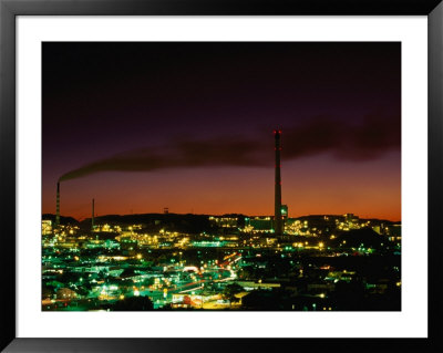 Smokestacks Of Mine And City At Sunset Mt. Isa, Queensland, Australia by Barnett Ross Pricing Limited Edition Print image