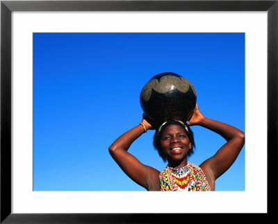 Zulu Woman Carrying Beer Pot, Zululand, South Africa by Ariadne Van Zandbergen Pricing Limited Edition Print image