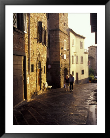 Couple Walking On Narrow Street, Radda In Chianti, Tuscany, Italy by John & Lisa Merrill Pricing Limited Edition Print image