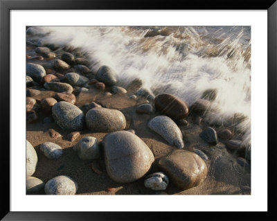 A Close View Time Exposure Of Surf Washing Over Stones On The Beach by Michael S. Lewis Pricing Limited Edition Print image