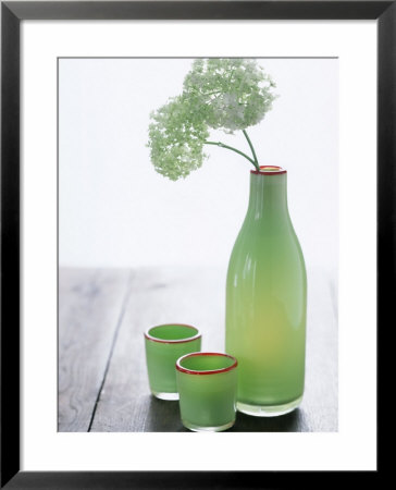 Green Bottle With Flowers And Green Glasses by Alena Hrbkova Pricing Limited Edition Print image