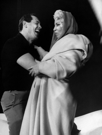 Rock Hudson Roaring With Laughter, Embracing Mae West At Rehearsal Of 30Th Annual Academy Awards by Leonard Mccombe Pricing Limited Edition Print image