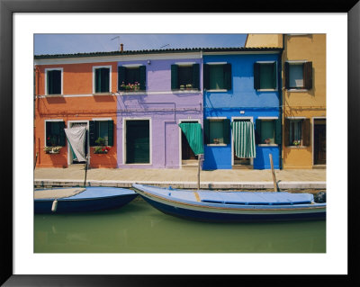 A View Of The Brightly Colored Buildings Of Burano With Gondolas Floating At Their Doorsteps by Richard Nowitz Pricing Limited Edition Print image