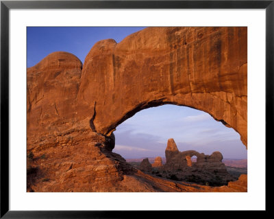 Double Arch Frames Turret Arch At Dawn, Arches National Park, Utah, Usa by Paul Souders Pricing Limited Edition Print image