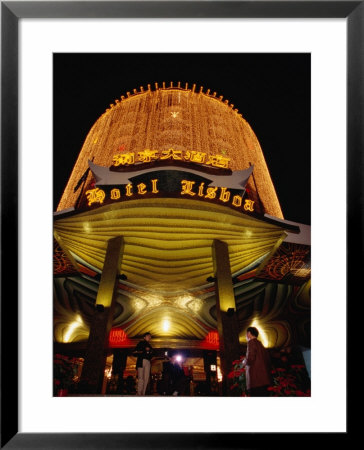 Hotel Lisboa Casino Entrance Lit Up At Night, Macau, China by Lawrence Worcester Pricing Limited Edition Print image