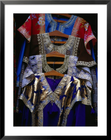 Embroidered Arab Clothing For Sale At Souk Manama, Al Manamah, Bahrain by Phil Weymouth Pricing Limited Edition Print image