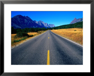Road With Mountain Range In Distance Glacier National Park, Montana, Usa by Rob Blakers Pricing Limited Edition Print image