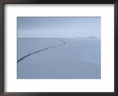 Aerial View Of An Open Lead In The Frozen Southern Ocean by Maria Stenzel Pricing Limited Edition Print image