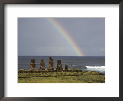 A Rainbow Arches Above Statues Carved From Volcanic Rock by James P. Blair Pricing Limited Edition Print image