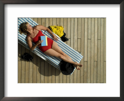 Woman Sleeping On The Deck Of A Cruise Ship by Todd Gipstein Pricing Limited Edition Print image
