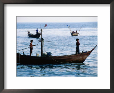 Fishermen Standing In Boat Hua Hin, Prachuap Khiri Khan, Thailand by John Hay Pricing Limited Edition Print image