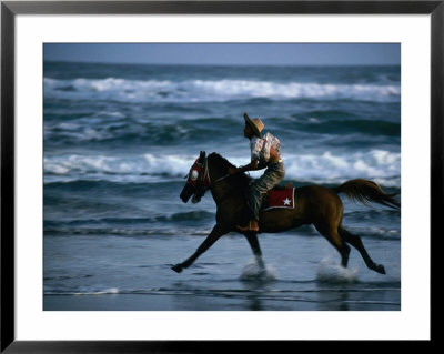 Boy Riding Pony On Beach Parangtritis, Central Java, Indonesia by Phil Weymouth Pricing Limited Edition Print image