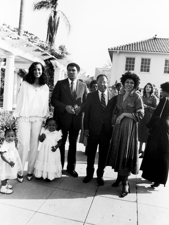Muhammad Ali And Family At Ali's Semi-Open House, June Of 1979 by Isaac Sutton Pricing Limited Edition Print image