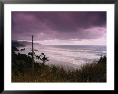 A Scenic View Of Clouds Over The Oregon Coast by Paul Nicklen Pricing Limited Edition Print image