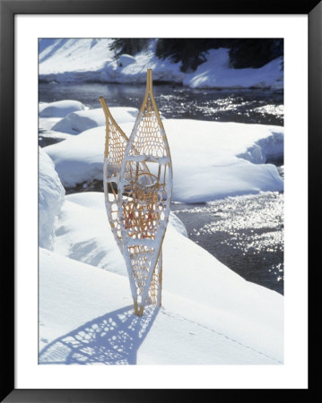 Snowshoes In Snow By River, Alaska by Mike Robinson Pricing Limited Edition Print image