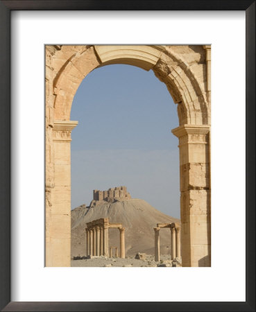 Qala'at Ibn Maan Citadel Castle Seen Through Monumental Arch, Archaelogical Ruins, Palmyra, Syria by Christian Kober Pricing Limited Edition Print image
