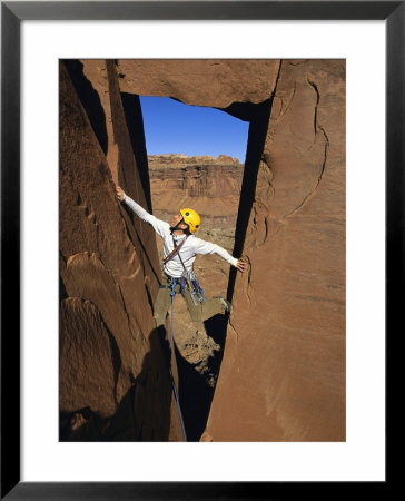 Rock Climbing On Desert Tower, Utah by Bill Hatcher Pricing Limited Edition Print image