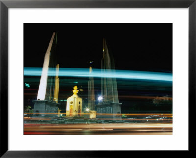 Moving Traffic At Democracy Monument, Bangkok, Thailand by Ryan Fox Pricing Limited Edition Print image