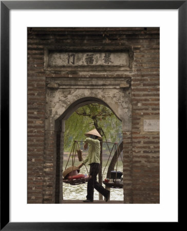 Lady Carrying Baskets, Hoan Kiem Lake, Hanoi, Northern Vietnam, Southeast Asia by Christian Kober Pricing Limited Edition Print image