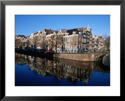 Buildings Along Keizersgracht Reflected In Canal, Southern Canal Belt, Amsterdam, Netherlands by Martin Moos Pricing Limited Edition Print image