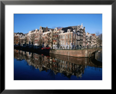 Buildings Along Keizersgracht Reflected In Canal, Southern Canal Belt, Amsterdam, Netherlands by Martin Moos Pricing Limited Edition Print image