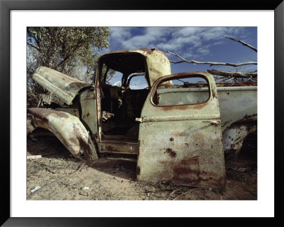 An Old Wrecked Truck In A Desert Environment by Jason Edwards Pricing Limited Edition Print image