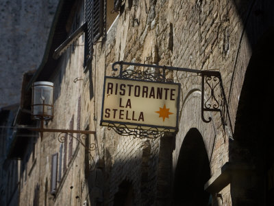 Restaurant Sign, San Gimignano, Italy by Robert Eighmie Pricing Limited Edition Print image