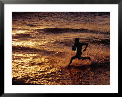 Boy Playing Ball On Galle Beach At Sunset, Colombo, Sri Lanka by Richard I'anson Pricing Limited Edition Print image