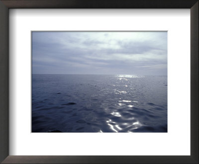 Calm Ocean With Small Ripples Reflects A Sunbeam Off The Surface, Australia by Jason Edwards Pricing Limited Edition Print image