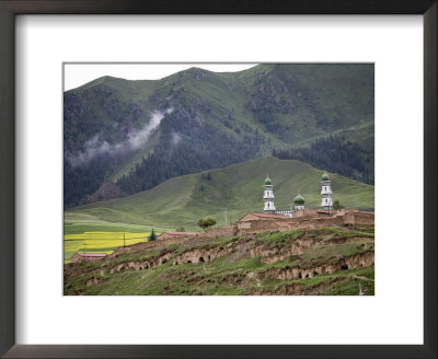 Islamic Village And Mosque Beneath Tree Covered Mountains, Qinghai, China by David Evans Pricing Limited Edition Print image