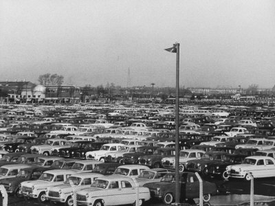 Masses Of New Fords For Export Standing Bumper To Bumper In Huge Open Air-Field At Dagenham Plant by Carl Mydans Pricing Limited Edition Print image