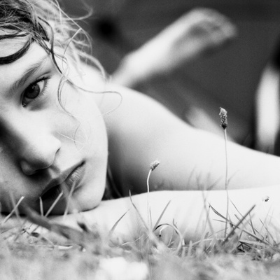 A Young Girl Lying In The Grass by Jewgeni Roppel Pricing Limited Edition Print image