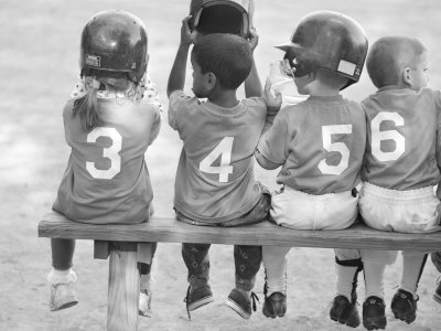 Four Young Baseball Players Wearing Sequential Numbers by Images Monsoon Pricing Limited Edition Print image