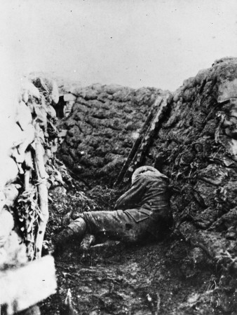 A Dead British Soldier Lies In A Trench, Somewhere On The Somme by Robert Hunt Pricing Limited Edition Print image