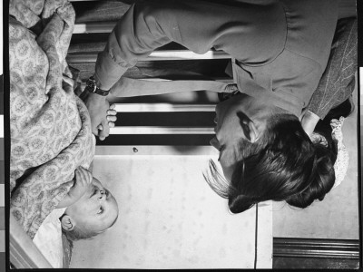 Army Sgt. Bill Mauldin, 23, With His Wife, Holding His Son By The Hand, 1St Day Home From The War by Martha Holmes Pricing Limited Edition Print image