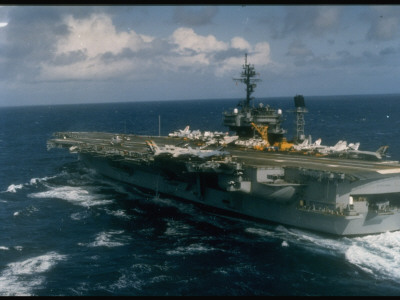 Aircraft Carrier Uss Kitty Hawk, With Numerous Aircraft Parked On Flight Deck, In Pacific Ocean by Phan M. Langway Pricing Limited Edition Print image