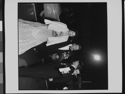 Actor Kirk Douglas Escorting Irene Wrightsman To The 22Nd Annual Academy Awards by Ed Clark Pricing Limited Edition Print image