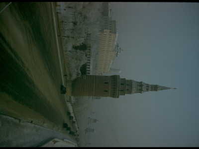 Frost-Fringed Trees Framed By Kremlin Tower And Palace In Wintry Moscow Vista by Carl Mydans Pricing Limited Edition Print image