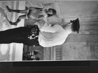 Child Passing Guard At Entrance To Watergate Hearings by Gjon Mili Pricing Limited Edition Print image