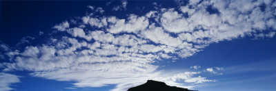 A Cloudy Sky Above A Mountain Top by Hordur Danielsson Pricing Limited Edition Print image